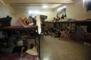 Palestinian inmates sleep inside the new jail controlled by the Hamas police in Gaza City August 5, 2009. The jail was opened after Gaza's main prison was destroyed during the
