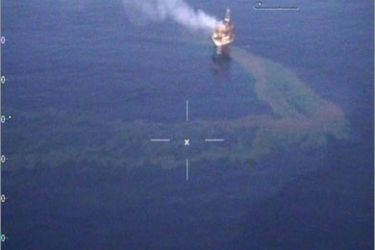 This Australian Maritime Safety Authority (AMSA) handout photo received on August 22, 2009 shows an oil leak (C) coming from the offshore