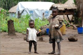 Refugee children from the Democratic Republic of Congo stand at the Makpandu camp in the southern Sudanese region of Western Equatoria on July 5,
