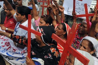 Human Liberation Commission of Pakistan activists shout slogans during a protest in Lahore on August 1, 2009 against alleged anti-Christian violence in Gojra village.