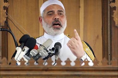 Palestinian Hamas leader Ismail Haniya delivers the weekly Friday prayers sermon at a mosque in Beit Lahia in the northern Gaza Strip on August 14