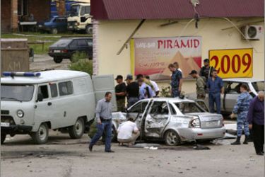 REUTERS/A general view of the scene of a suicide bomb attack along Zhukovsky street in central Grozny, August 21, 2009. Two suicide bombers on bicycles killed four