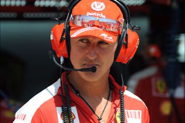 seven times drivers champion and Ferrari team advisor Michael Schumacher is pictured in the pits of the Valencia Street Circuit on August 21, 2009