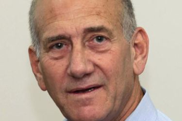 arraignment hearing on charges of graft, on September 25, 2009 in Jerusalem. Olmert is accused of unlawfully accepting gifts of cash-stuffed envelopes from Jewish-American businessman Morris Talansky and of multiple-billing foreign trips.
