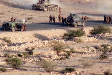 (FILES) A picture released on September 28, 2009 by the Yemeni army's media office shows Yemeni troops in their armoured vehicles on the frontline with Shiite rebels they are battling in the flashpoint Saada province, 240 kms north of Sanaa.