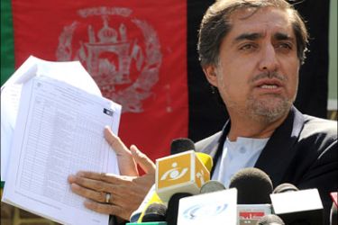 afp : Afghan presidential candidate Abdullah Abdullah shows evidence of alleged fraud during a press conference in Kabul on September 5, 2009. Afghanistan's main challenger for the