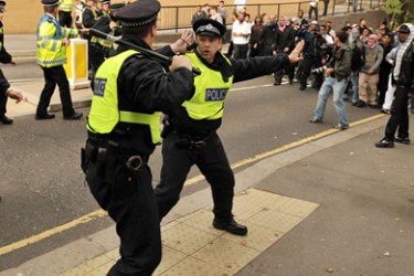 Police try to contain unrest in Harrow, North London, on September 11, 2009. Riot police intervened to quell clashes between Muslims and anti-Islamic extremists protesting