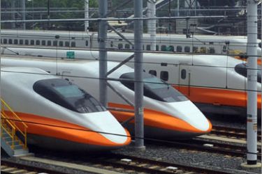 Trains of Taiwan's high-speed rail company rest at the platform at Zuoying station, south of Kaohsiung city, on September 22, 2009