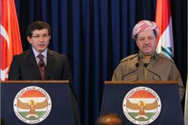 Turkish Foreign Minister Ahmet Davutoglu (L) speaks during a joint press conference with Kurdish Regional president Massud Barzani in Arbil, 350 kms from Baghdad, on October 30, 2009. Davutoglu stressed the importance of ties with Iraq, which he said provided a gateway for Ankara to the Gulf, on a historic visit