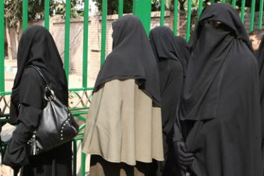 Cairo University students wearing the niqab, a black veil which covers the face except for the eyes, stand outside the university dormitory on October 7, 2009, unable to enter due to new rules preventing admission to niqab wearers.