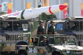 China's military show off their latest missiles during the National Day parade in Beijing on October 1, 2009