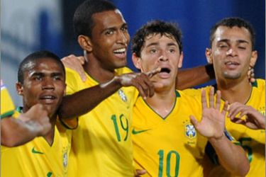 Brazilian player Maicon (2nd L) celebrates with his teammates after scoring a goal against Germany during their FIFA Under-20 World Cup quarter-final