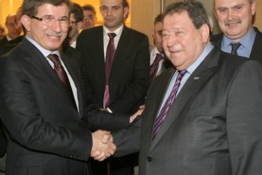 Israel's Industry and Trade Minister Benjamin Ben-Eliezer (R) shakes hands with Turkish Foreign Minister Ahmet Davutoglu before a meeting at the Esenboga Airport in Ankara, on November 23, 2009.