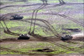 afp : Israeli soldiers in their Armored Personnel Carriers (APC) attend a military exercise near the Israeli town of Katzrin, in the Israeli-occupied Golan Heights, on November