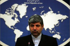 Iranian newly appointed foreign ministry spokesman, Ramin Mehmanparast, holds a press conference in Tehran on November 24, 2009. Two top Iranian officials, including