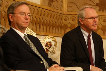 US Ambassador to Iraq Christopher Hill readies to speak as Google chief executive Eric Schmidt (L) listens on following a press conference at the recently-restored National Museum