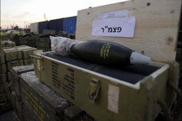afp : The Israeli military display at the port of Ashdod on November 4, 2009 what they said were hundreds of tonnes of arms sent from Iran to the Lebanese Hezbollah militia after