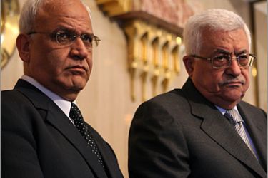 Palestinian president Mahmud Abbas (R) and chief negotiator Saeb Erakat (L) hold a press conference after a meeting with Egyptian President Hosni Mubarak in Cairo on November 17, 2009. The leaders centered their talk on the