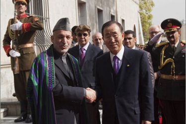 Afghan President Hamid Karzai meets with United Nations Secretary General Ban Ki-moon at the Presidential Palace in Kabul on November 2, 2009