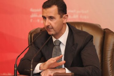 A handout picture released by the official Syrian Arab News Agency (SANA) shows President Bashar al-Assad addressing on November 11, 2009 in Damascus the opening session of the Fifth General Conference of Arab Parties, under the slogan: "Independent Arab Decision".