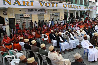 AFP - Men and women attend a political rally on December 4, 2009 on the island of Anjouan in the Comoros ahead of the December 6, legislative elections. A second round is