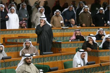Kuwaiti MPs attend a parliament session in Kuwait City on December 8, 2009. Kuwait's parliament unanimously ratified a Gulf monetary union pact as the emirate's