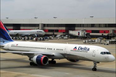 afp : (FILES) A Delta Airlines jets arrives at Atlanta-Hartsfield International Airport in Atlanta , Georgia on September 12, 2009. ABC News reported December 25, 2009 a passenger