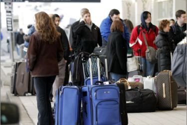 ROMULUS, MI - DECEMBER 26: Passengers wait to check in at the Detroit Metropolitan Airport December 26, 2009 in Romulus, Michigan. On Friday, a Nigerian