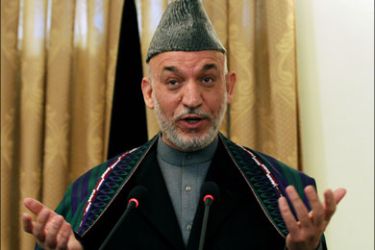afp : TO GO WITH Afghanistan-unrest-politics-UN,FOCUS by Lynne O'Donnell(FILES) In this picture taken on December 8, 2009, Afghanistan's President Hamid Karzai