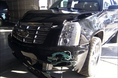 r_Damage of Tiger Woods' Cadillac Escalade from his single car accident is seen in Orlando, Florida November 27, 2009. REUTERS