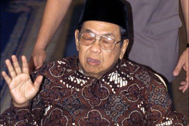 afp : (FILES) This file photo taken on August 23, 2000 shows Indonesian President Abdurrahman Wahid gesturing ahead of his opening speech before the announcement of