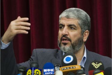 Hamas leader Khaled Meshaal speaks to journalists during a news conference in Tehran December 15, 2009. Meshaal said on Tuesday that Islamist militant groups would back Iran if the country was attacked by Israel