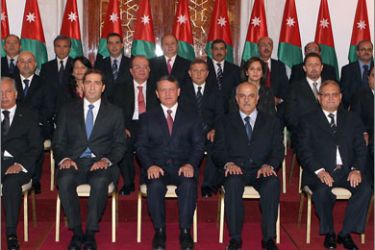 A handout picture from the Jordanian Royal Palace shows Jordan's King Abdullah II (front C) posing with his new cabinet members following the swearing in ceremony in Amman on December 14, 2009. The monarch swore in the seventh government of his reign, a 29-strong cabinet led by former palace aide Samir Rifai,