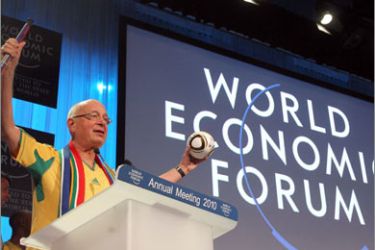 World Economic Forum founder and chairman Klaus Schwab waves during the "Davos kick-off for the 2010 FIFA World Cup in South Africa" on the fourth day of the World Economic Forum meeting in Davos on January 30, 2010. The annual World Economic Forum is attended by 2,500 top politicians, captains