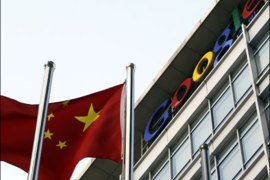 r - A Chinese national flag flies in front of the Google China headquarters in Beijing January 13, 2010. Google Inc said it may pull out of China because it is no longer willing to accept censorship of its search results, in a surprise retreat from the world's largest Internet market by users