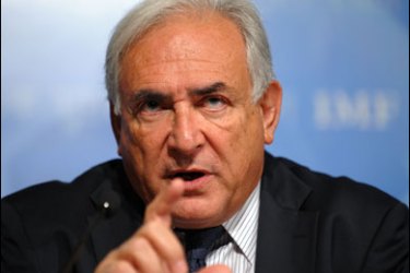 F/The International Monetary Fund head Dominique Strauss-Kahn speaks about Haiti earthquake victims during a press conference at the IMF headquarters in Washington, DC, on January 14, 2010.