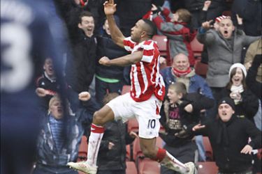 r_Stoke City's Ricardo Fuller (R) celebrates his second goal against Arsenal during their FA Cup soccer match at the Britannia Stadium in Stoke-on-Trent, central England January