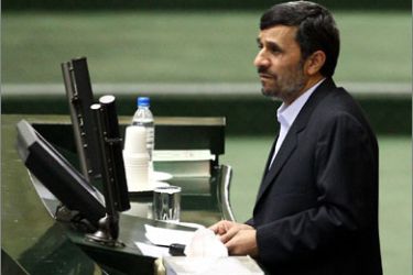 Iranian President Mahmoud Ahmadinejad addresses MPs during a parliamentary session where he presented the annual budget bill in Tehran on January 24, 2010.