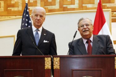 U.S. Vice President Joe Biden (L) and Iraq's President Jalal Talabani speak to the media after a meeting in Baghdad January 23, 2010.