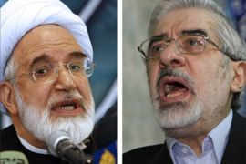 (FILES) A combo of recent file pictures shows Iranian opposition leader Mir Hossein Mousavi (R) speaking after voting for the presidential elections in Tehran on June 12, 2009 and fellow opposition head Mehdi Karroubi holding a press conference in the Iranian capital on October 12, 2008.