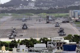 (FILES) File photo taken June 22, 2005 shows US helicopters and planes parked at Futenma US Marine Base in Ginowan, Okinawa Prefecture. Prime Minister Yukio Hatoyama has said he may scrap an agreement with Washington to relocate the base from its current site in a crowded urban area of Okinawa to a quieter coastal site in the Nago area by 2014. AFP PHOTO / FILES / Toru YAMANAKA