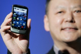 Peter Chou, CEO of HTC, holds the Google Nexus One smartphone his company will produce, running the Android platform, during the unveiling of the first mobile phone the internet company will sell directly to consumers, during a news conference at Google headquarters in Mountain View, California January 5, 2010.