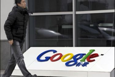 F/A man walks past the company logo in front of the Google China headquarters building in Beijing on January 20, 2010. The US and Chinese governments have had "multiple meetings" about a row between Google and China over Internet freedom, and plan to have more in the next few days, a senior US diplomat said. AFP PHOTO/ LIU Jin