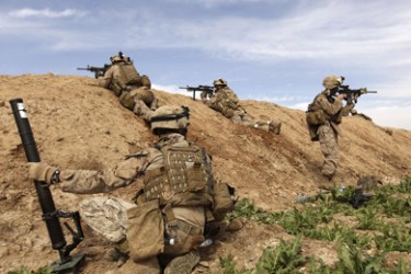 US marines with 1/3 Charlie Company battle Taliban on the North East of Marjah on February 12, 2010. An Afghan army commander said February 13 that five Taliban militants