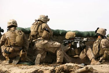 US Marines with 1/3 Charlie Company battle with insurgents in the North East of Marjah on February 11, 2010. The Taliban vowed to fight back with a "hit and run" guerrilla campaign against Western and Afghan forces
