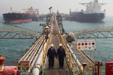 Oil tankers are anchored at Basra harbour, 550 kms (340 miles) south of Baghdad, on February 19, 2010. Iraqi Oil Minister Hussein al-Shahristani announced the construction