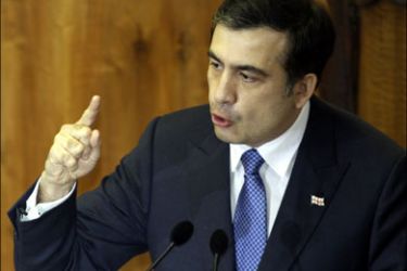 r : Georgia's President Mikheil Saakashvili speaks during his annual address to parliament in Tbilisi February 26, 2010. REUTERS/David Mdzinarishvili (GEORGIA - Tags: