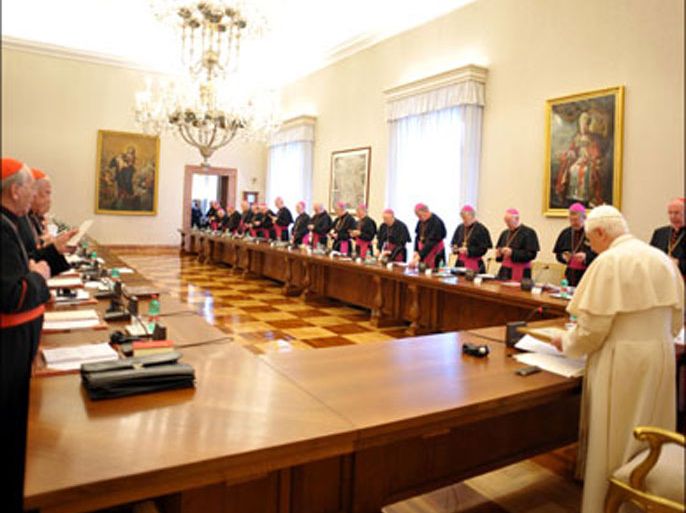 afp : This handout picture released by The Vatican press office on February 15, 2010 shows Pope Benedict XVI (C) meeting with Ireland's bishops at The Vatican. The Pontiff