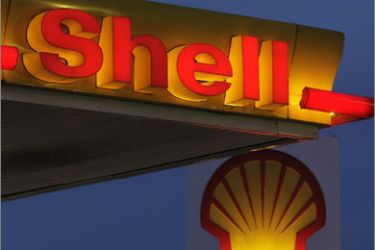(FILES) In this file picture taken on January 30, 2009 company logos and signage are displayed at a Shell petrol station in east London