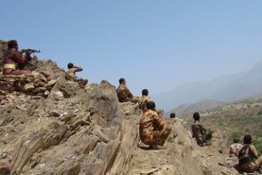 Yemeni soldiers take position in the northwest Saada province where they are battling Shiite Huthi rebels on February 10, 2010. Fighting continued between Huthi rebels and the Yemeni army despite the government's announcement of a timetable for a ceasefire, to which the rebels have yet to respond.